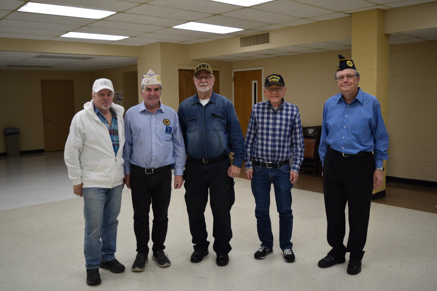 Steve Friedman, far left, Gary Glick, Eric Spinner, Jeff Newman and Ed Freeberg are members of Jewish War Veterans Post 652, in Merrick.